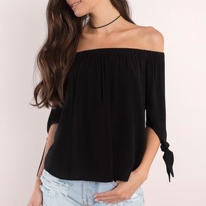 Black off-the-shoulder top with tie sleeves